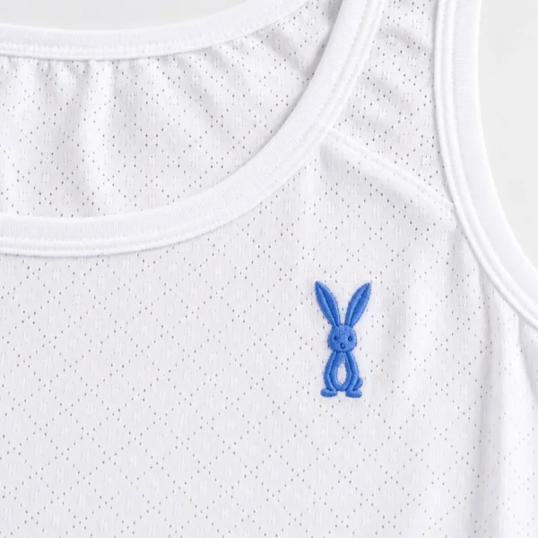 Close-up of breathable cotton innerwear texture and blue bunny embroidery on broad strap camisole.