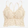 Lace camisole top with strappy back camisole straps for stylish women's innerwear.