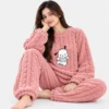 Pink cozy winter night suit for women featuring cartoon print knitted pajama set.