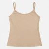 Plain skin color cotton shameez and beige undergarment camisole for women flat lay on neutral background.