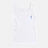 Plain white cotton shameez and broad strap camisole flat lay on light background.